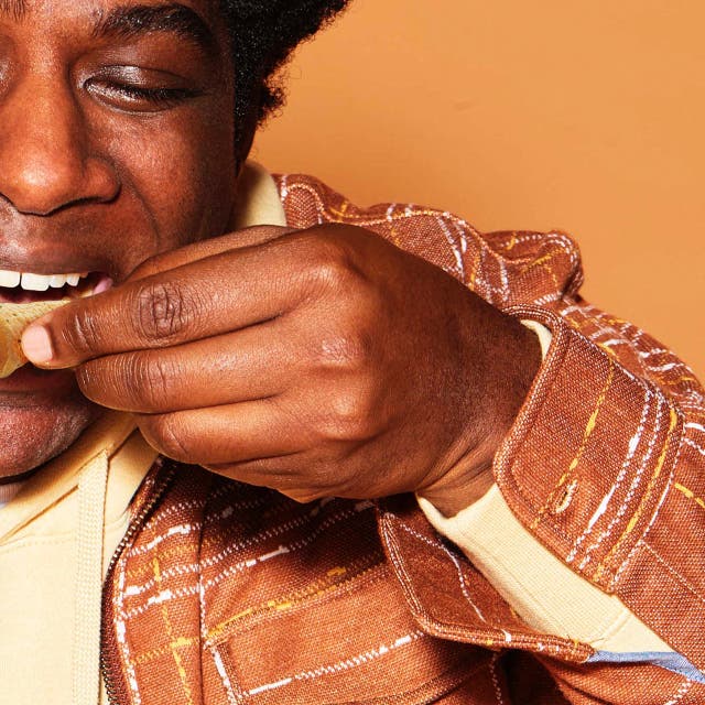 man eating a chip